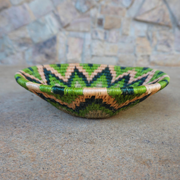 "Handcrafted shallow curved bowl showcasing rustic charm and timeless elegance, perfect for fruits, snacks, or decor."