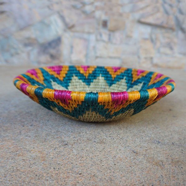 "Handcrafted shallow curved bowl showcasing rustic charm and timeless elegance, perfect for fruits, snacks, or decor."