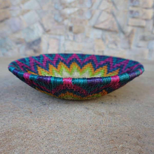 "Handcrafted shallow curved bowl showcasing rustic charm and timeless elegance, perfect for fruits, snacks, or decor."