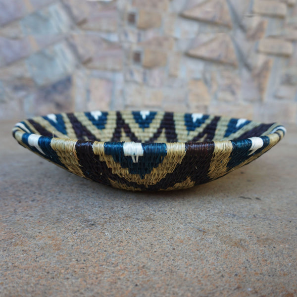 "Handcrafted shallow curved bowl showcasing rustic charm and timeless elegance, perfect for fruits, snacks, or decor."