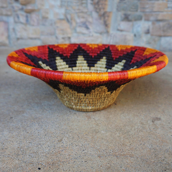 "Handwoven Lavumisa baskets showcasing intricate patterns and vibrant colors, perfect for adding a touch of cultural flair to your home decor."